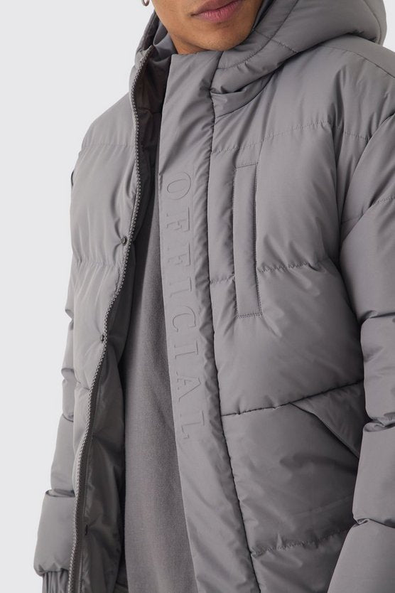 Official Embossed Hooded Puffer Coat In Charcoal