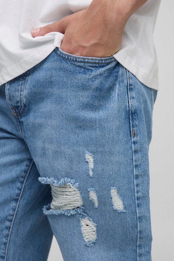 Relaxed Flared Ripped Knee Blue Wash Jeans