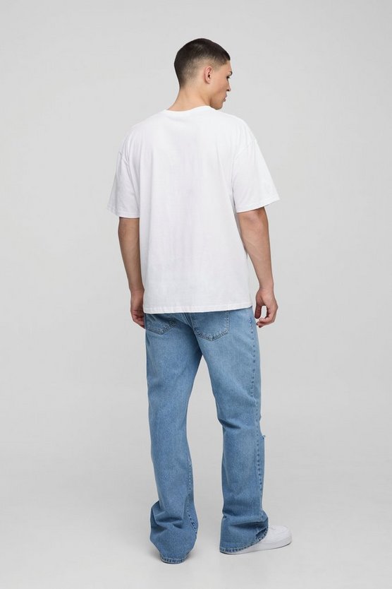 Relaxed Flared Ripped Knee Blue Wash Jeans